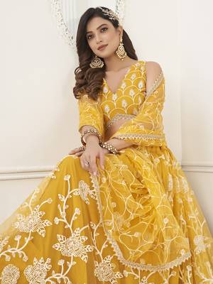 appealing mustard yellow embroidered net haldi lehenga set choli with dupatta 4