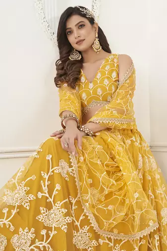 appealing mustard yellow embroidered net haldi lehenga set choli with dupatta