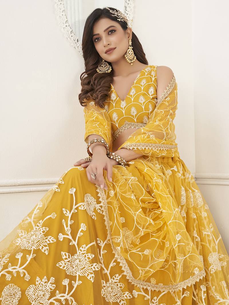Appealing Mustard Yellow Embroidered Net Haldi Wear Lehenga Choli
