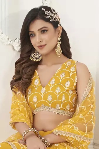 appealing mustard yellow embroidered net haldi lehenga set choli with dupatta