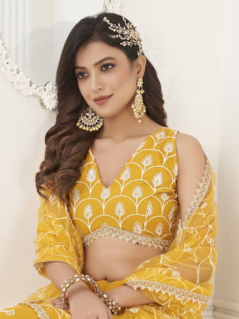 Appealing Mustard Yellow Embroidered Net Haldi Wear Lehenga Choli