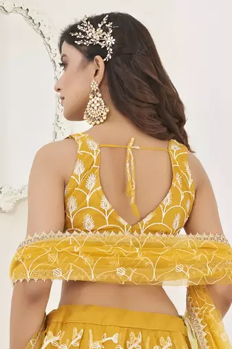 appealing mustard yellow embroidered net haldi lehenga set choli with dupatta