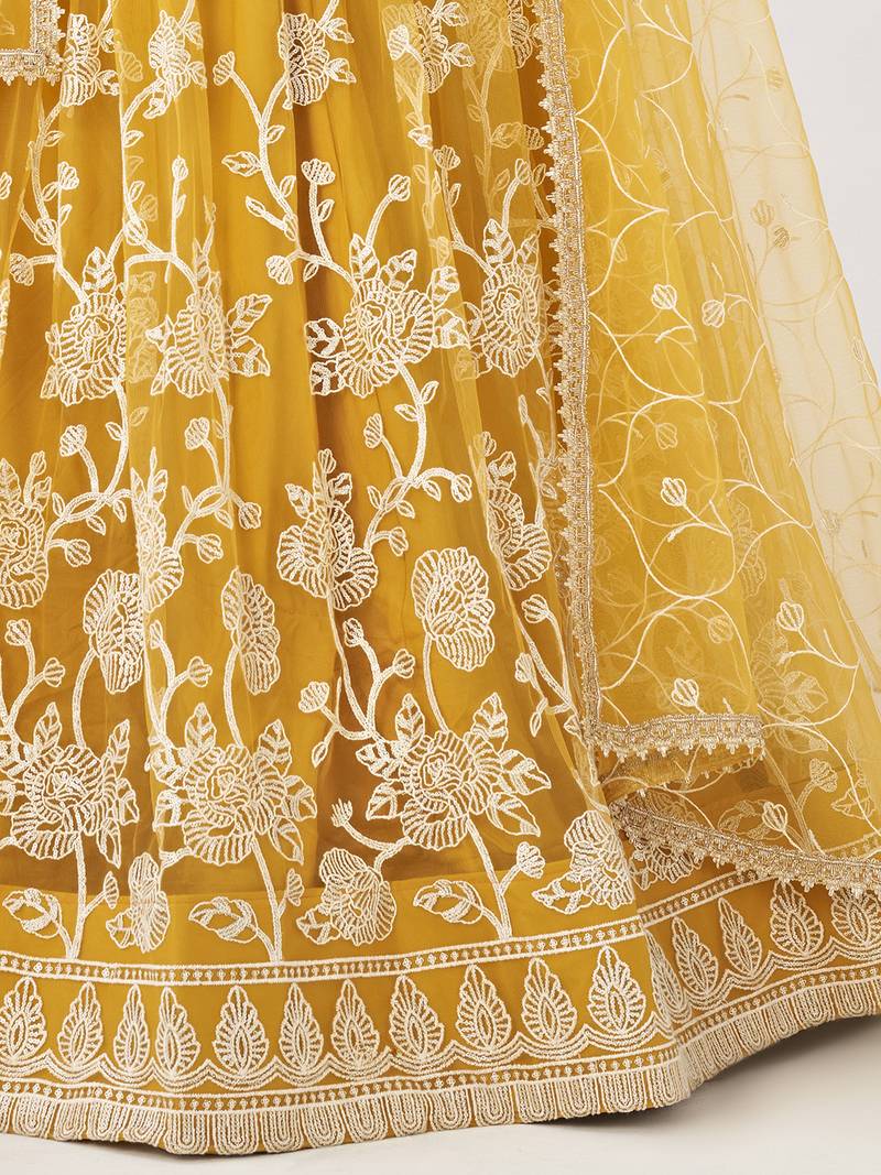 Appealing Mustard Yellow Embroidered Net Haldi Wear Lehenga Choli
