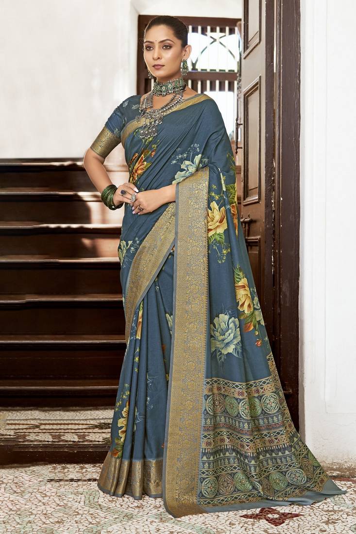Girlish slate blue colour wevon border saree with designer printed looks
