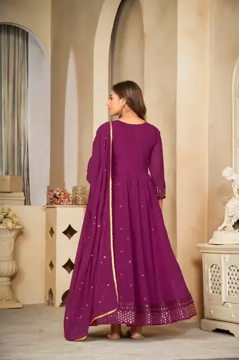 Purple colour ethnic resham embroidered heavy partywear dress