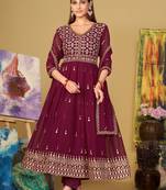 Smartly designed dark pink colour partywear anarkali dress