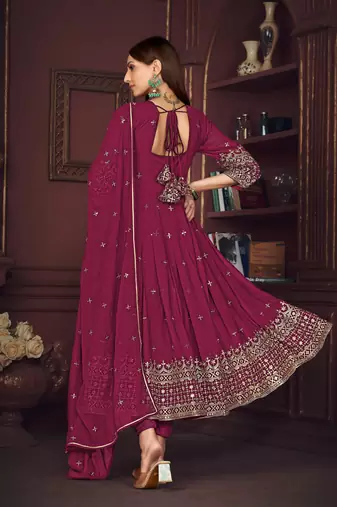 Dark pink colour heavy embroidered partywear anarkali suit