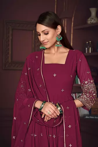 Dark pink colour heavy embroidered partywear anarkali suit