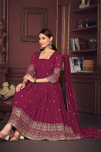 Dark pink colour heavy embroidered partywear anarkali suit