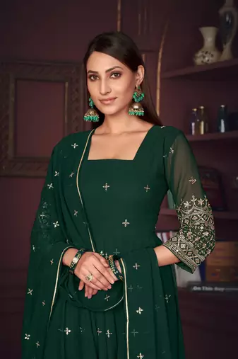 Green colour heavy embroidered partywear anarkali suit