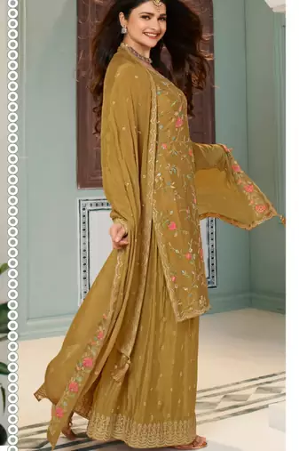 Ethnic and stylish mustard colour sharara dress for festive season
