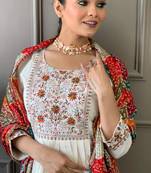 Smart and beautiful white colour girlish trendy festive wear salwar suit