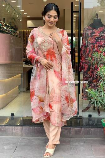 Smart and trendy peach colour beautiful festive suits