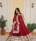Amazingly beautiful maroon colour ethnic gown with dupatta and elegant embroidery work