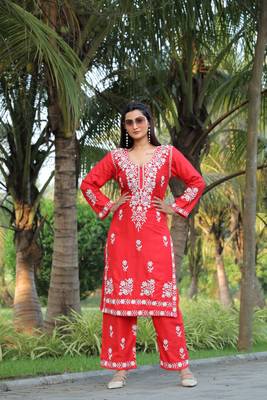 Orange colour ethnic chikankari embroidery work kurta bottom set 1