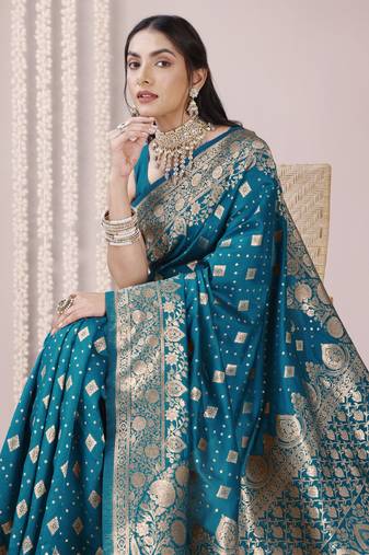 Dark teal art banarasi silk woven golden zari border saree with unstitched blouse piece