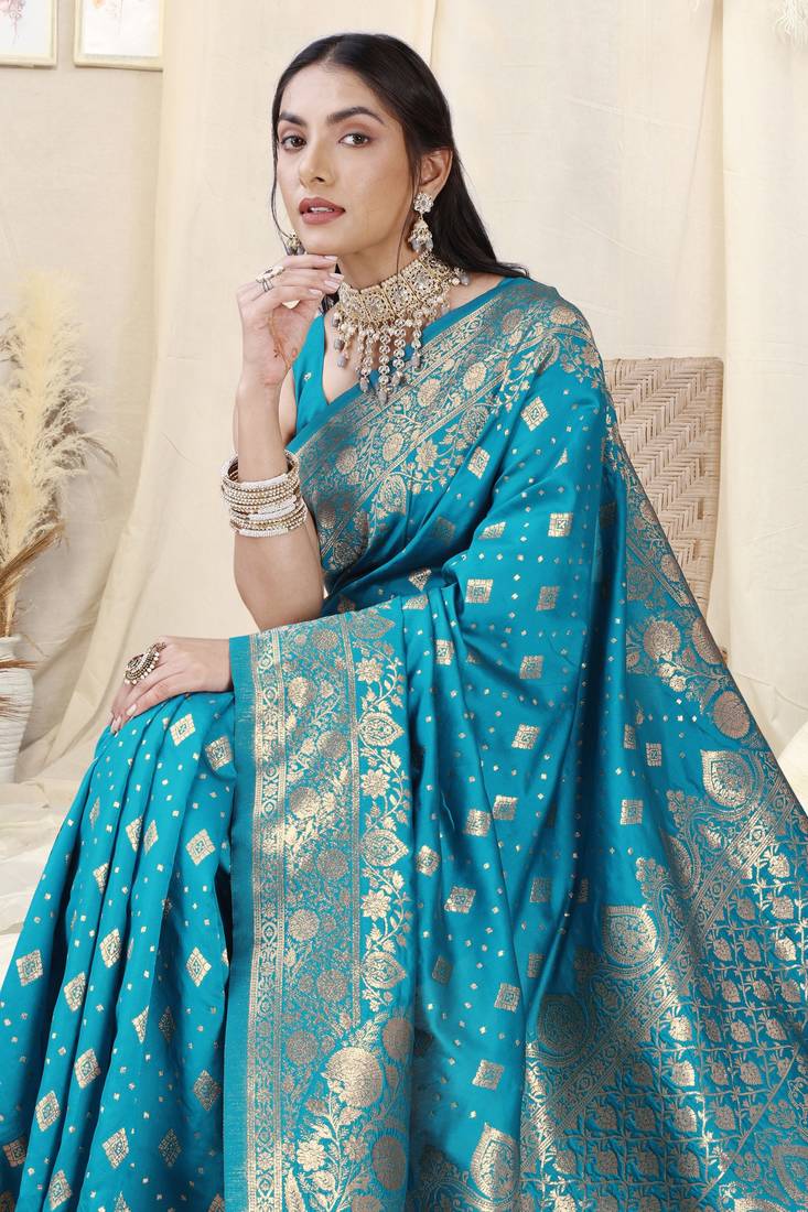 Turquoise banarasi silk woven design woven golden zari border saree with unstitched blouse piece