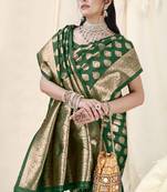 Green Banarasi silk blend woven design woven golden zari border saree with unstitched blouse piece