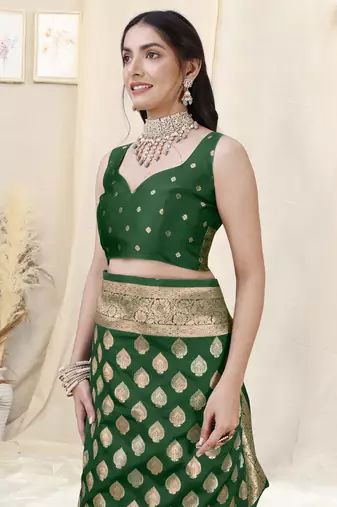 Green Banarasi silk blend woven design woven golden zari border saree with unstitched blouse piece