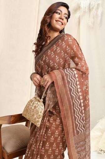 Brown Cotton Ikkat Print Tassels Saree With Unstitched Blouse Piece