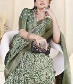Dusty green silk blend ethnic motifs woven zari border/tassels saree with unstitched blouse piece