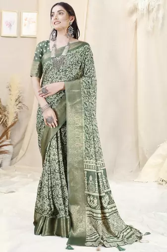 Dusty green silk blend ethnic motifs woven zari border/tassels saree with unstitched blouse piece