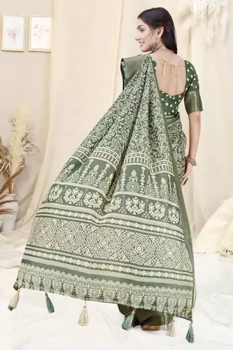 Dusty green silk blend ethnic motifs woven zari border/tassels saree with unstitched blouse piece