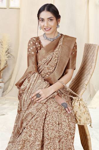 Brown silk blend ethnic motifs woven zari border/tassels saree with unstitched blouse piece