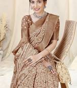 Brown silk blend ethnic motifs woven zari border/tassels saree with unstitched blouse piece