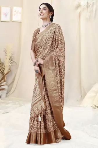 Brown silk blend ethnic motifs woven zari border/tassels saree with unstitched blouse piece
