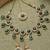 Drop shaped ad green stones collar bone necklace set with earring & maangtika jewellery set for women (ns105614)