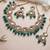 Gold-plated with ad green stones collar bone necklace set with stylish earrings jewellery set for women (ns105678)