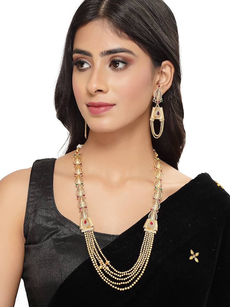 Intriguing gold plated rani haar long kundan studded matinee necklace set & earring jewellery set for women (ns105731)