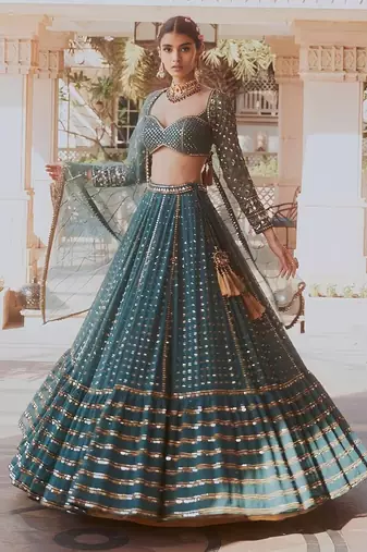 BOTTLE GREEN SEQUINS AND ZARI EMBROIDERED FAUX GEORGETTE LEHENGA SET WITH CHOLI AND DUPATTA