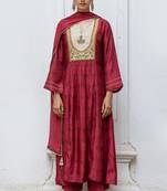Wine raw silk printed and hand detailed festive salwar suit
