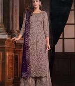 Chikoo  Soft Net Embroidered Designer Palazzo Suit
