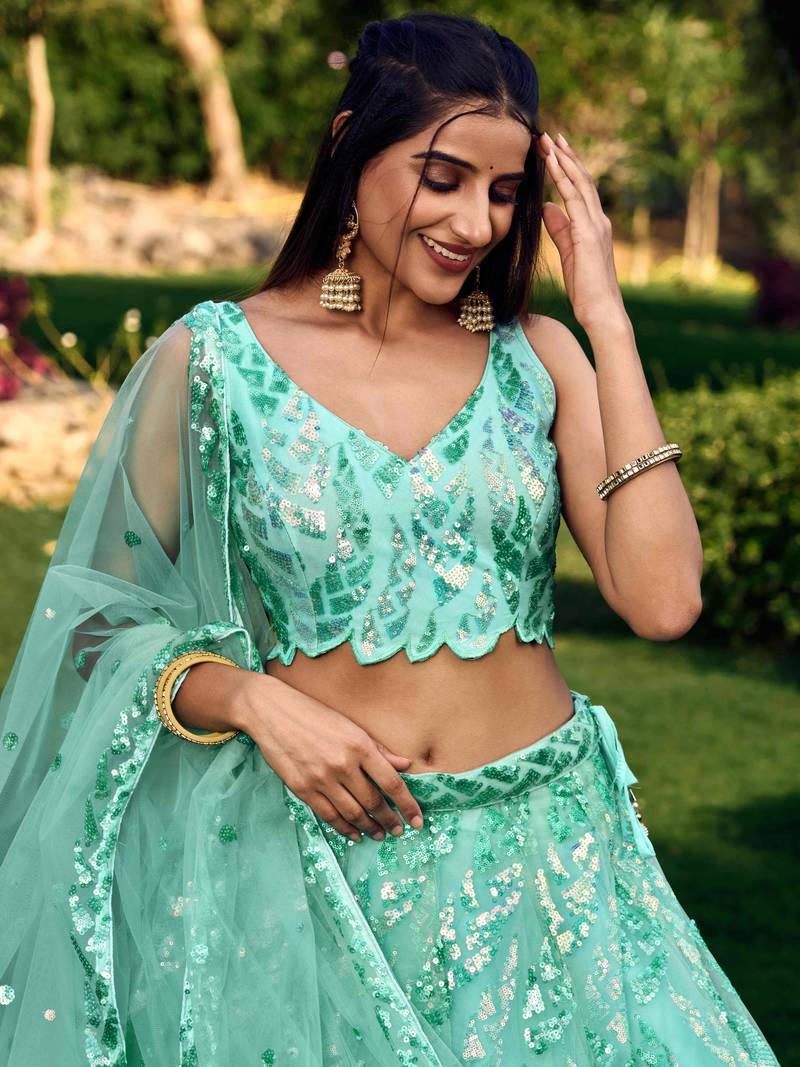 Wonderful Turquoise Sequins Net Reception Wear Lehenga Choli