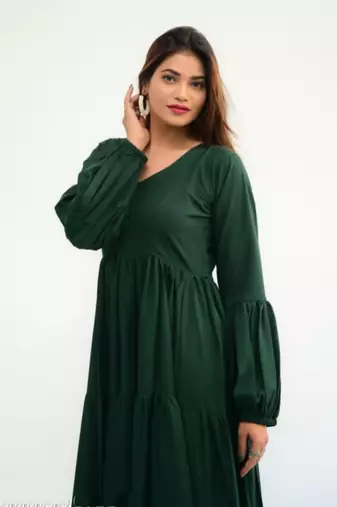 Green colour classy silk long kurti for smart festive looks