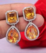 Mustard yellow color american diamond earrings
