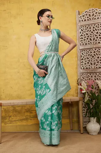 Silk Land Teal Woven Design Cotton Saree With Unstitched Blouse Piece