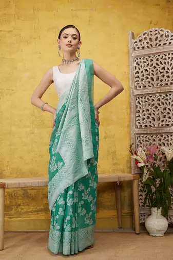 Silk Land Teal Woven Design Cotton Saree With Unstitched Blouse Piece