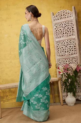 Silk Land Teal Woven Design Cotton Saree With Unstitched Blouse Piece