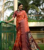 Orange kalamkari digital printed saree with zari weaving border