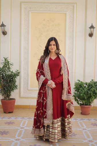 Women's maroon faux blooming with embroidered zari sequins work wedding gown