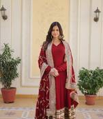 Women's maroon faux blooming with embroidered zari sequins work wedding gown