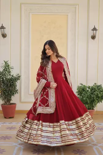 Women's maroon faux blooming with embroidered zari sequins work wedding gown