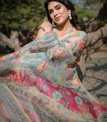 Beige organza floral print/animal print zari border saree with unstitched blouse piece