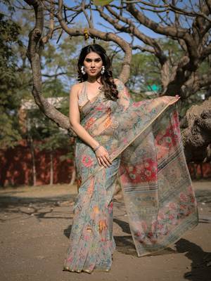 Beige organza floral print/animal print zari border saree with unstitched blouse piece 2
