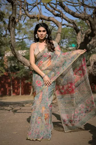 Beige organza floral print/animal print zari border saree with unstitched blouse piece