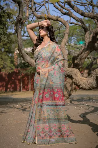 Beige organza floral print/animal print zari border saree with unstitched blouse piece